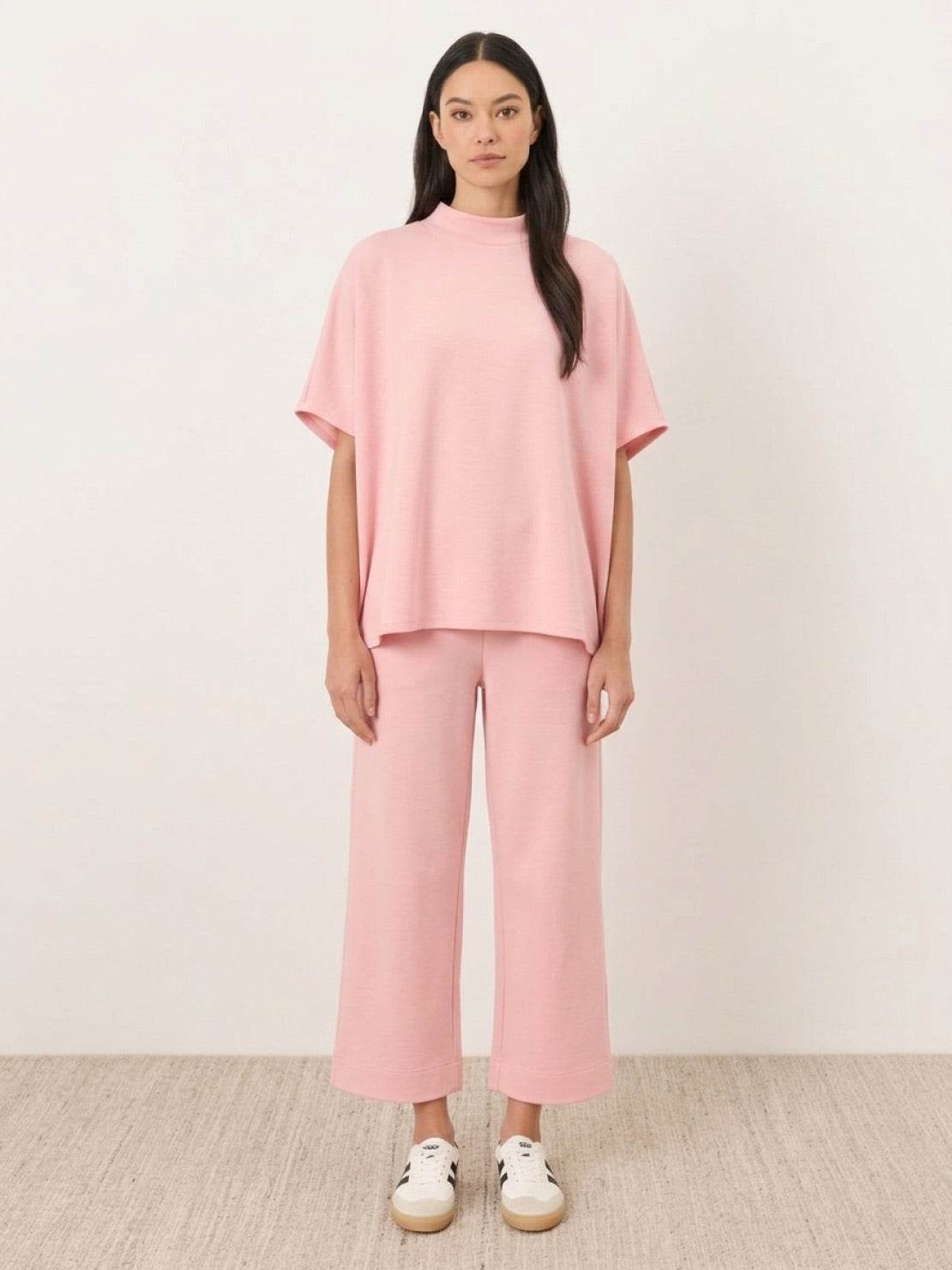 Woman wearing cotton-blend capelet lounge set with mock neck top and wide-leg pants in chocolate brown