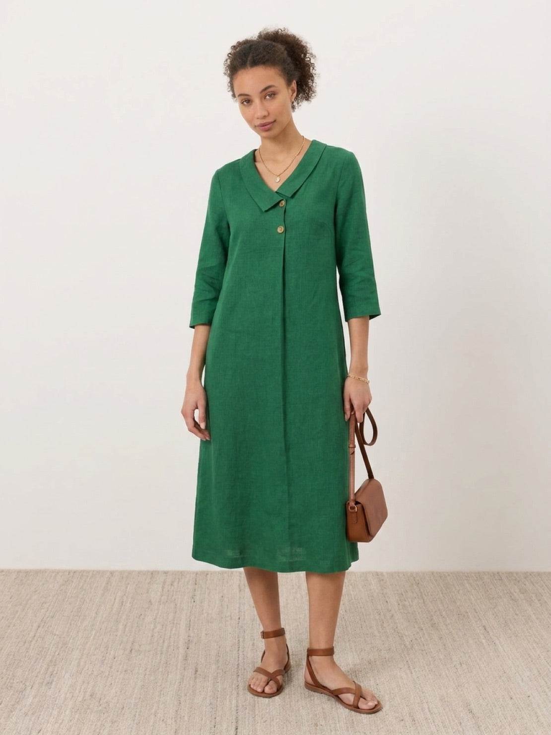 Navy linen-look midi dress with relaxed A-line silhouette and side pockets