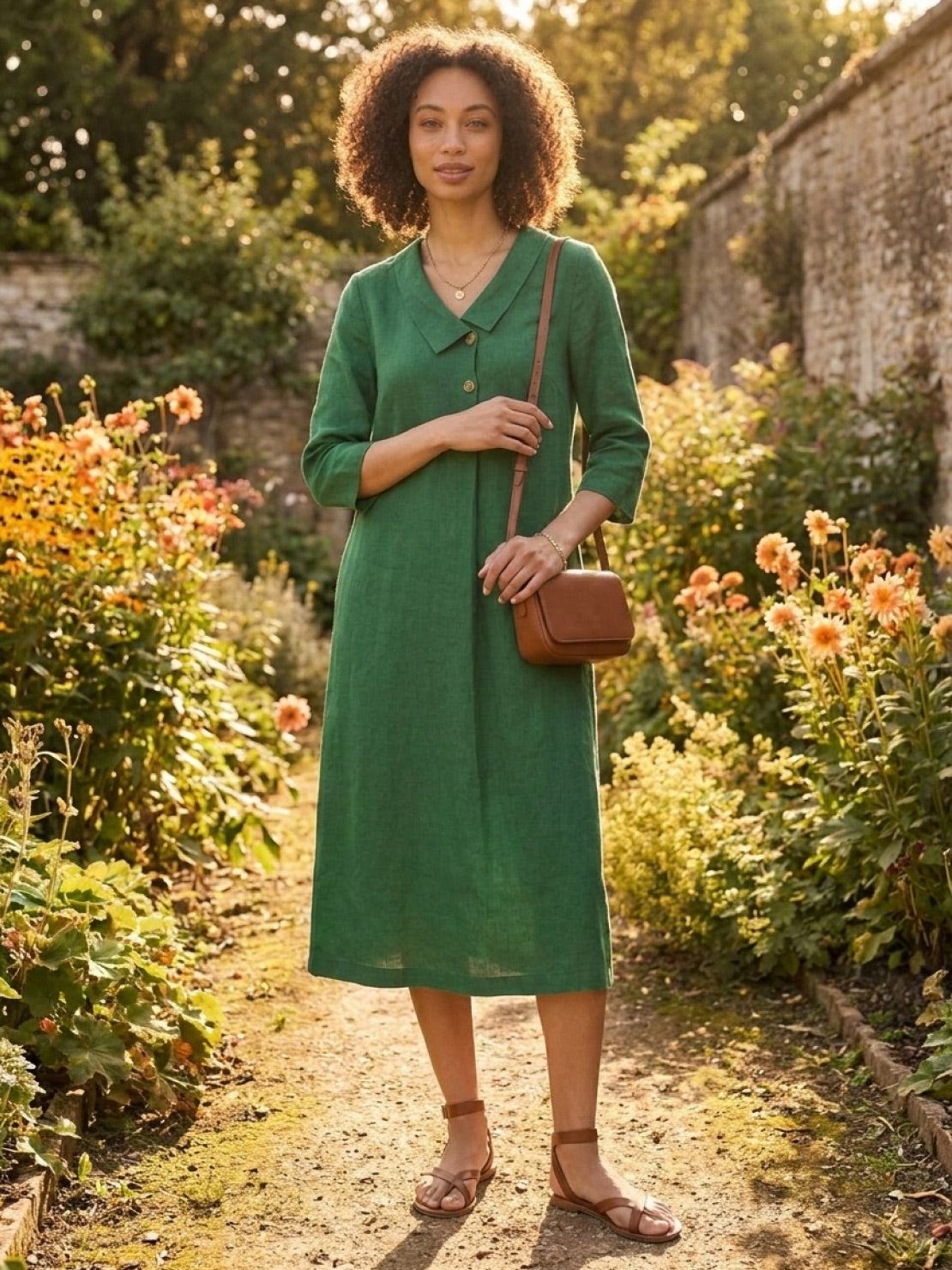 linen-look midi dress in relaxed A-line silhouette with side pockets and button detail