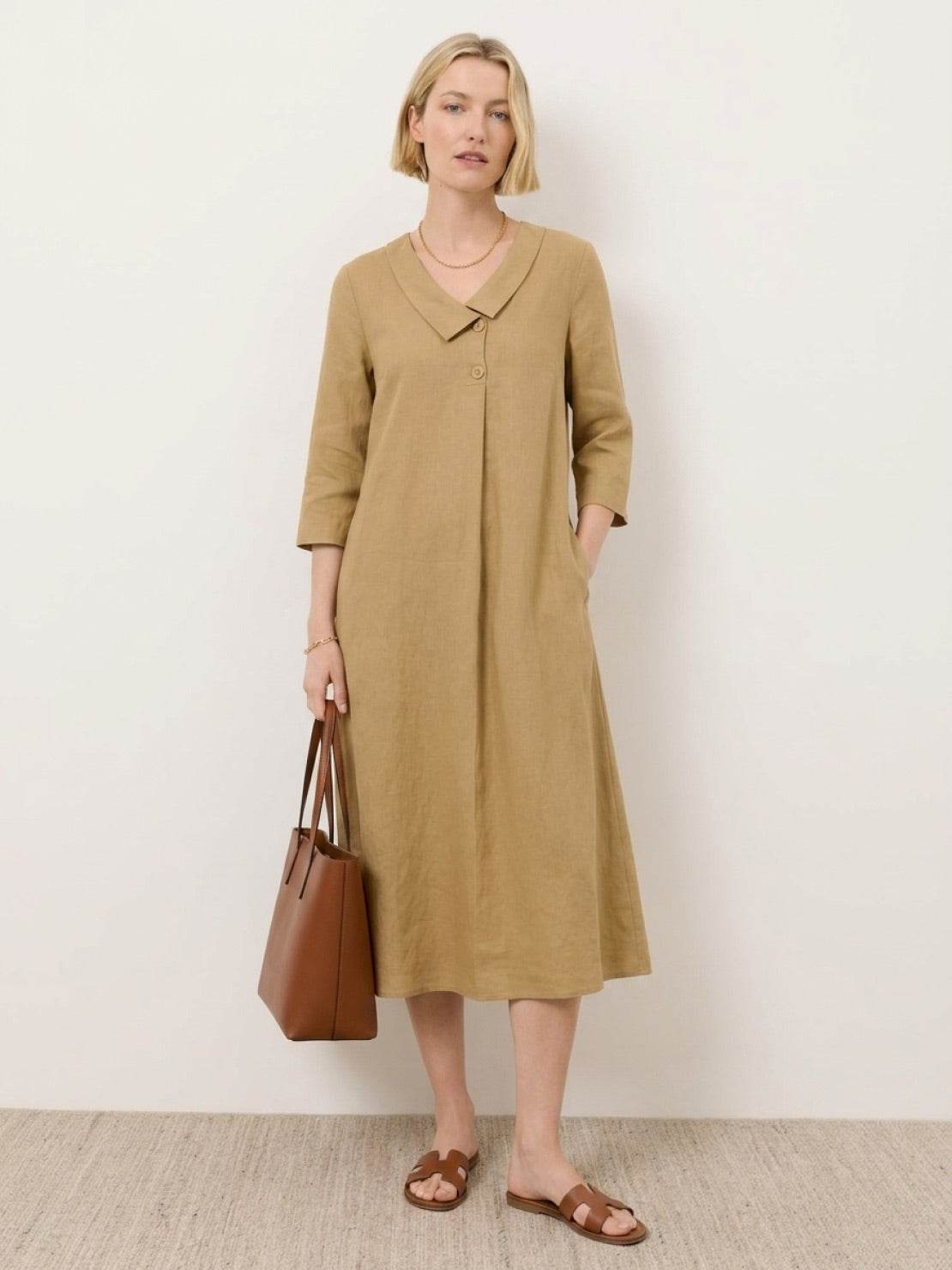 Linen-look midi dress with relaxed A-line silhouette, 3/4 sleeves, button chest detail, and side pockets