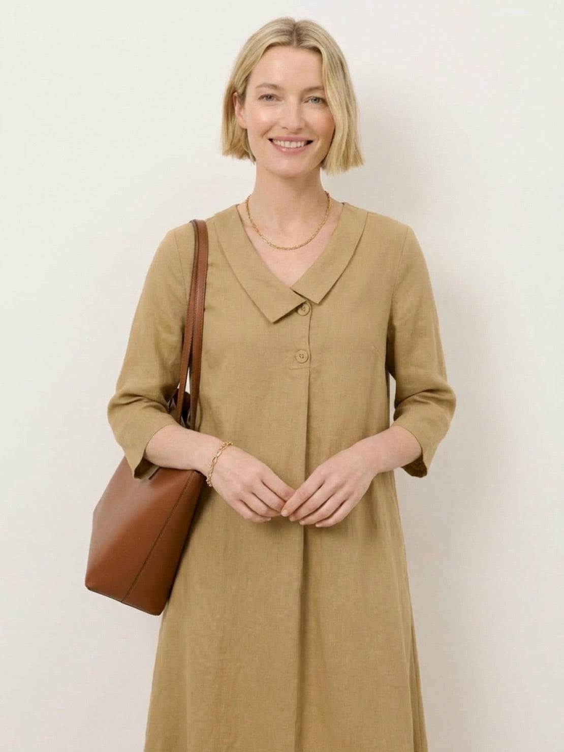 linen-look midi dress with blazer neckline and side pockets on mannequin