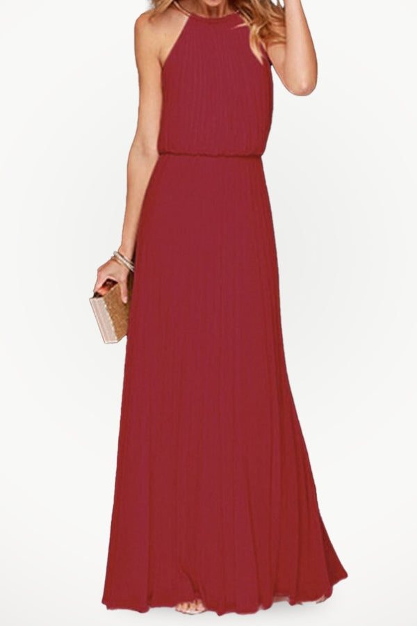 Sleeveless belted maxi pleated dress in red wine color with a cinched waist and flowing chiffon material.
