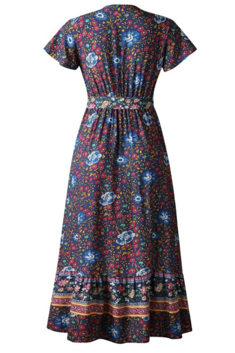 Back view of Bohemian floral print wrap dress with short sleeves and ruffle skirt on dark fabric