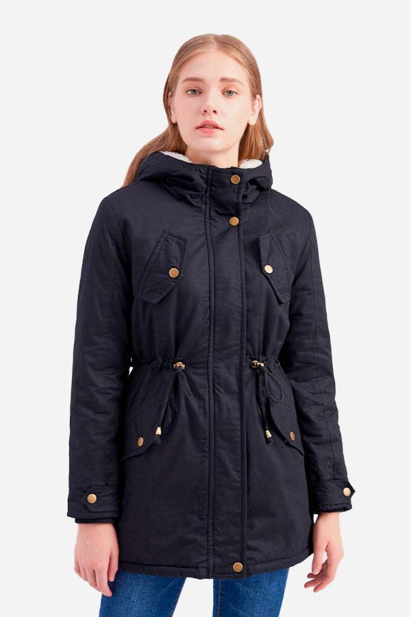 Woman wearing extra comfortable cotton parka coat with hood and button details in black
