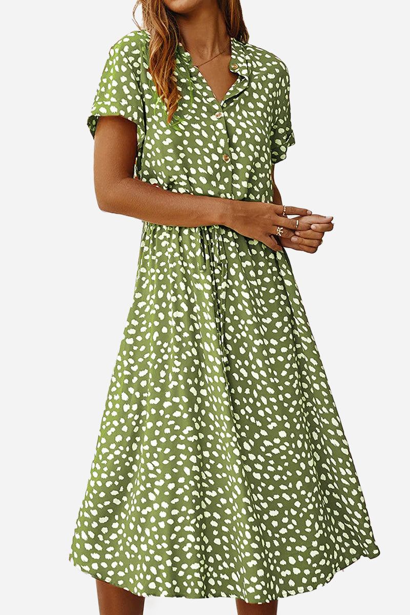 Green casual bohemian dress skirt with white dot print, short sleeves, and button-up front