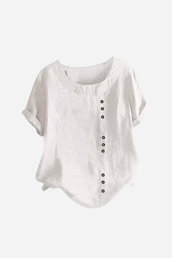 White relaxed fit linen button-up tee with short sleeves and stylish buttons
