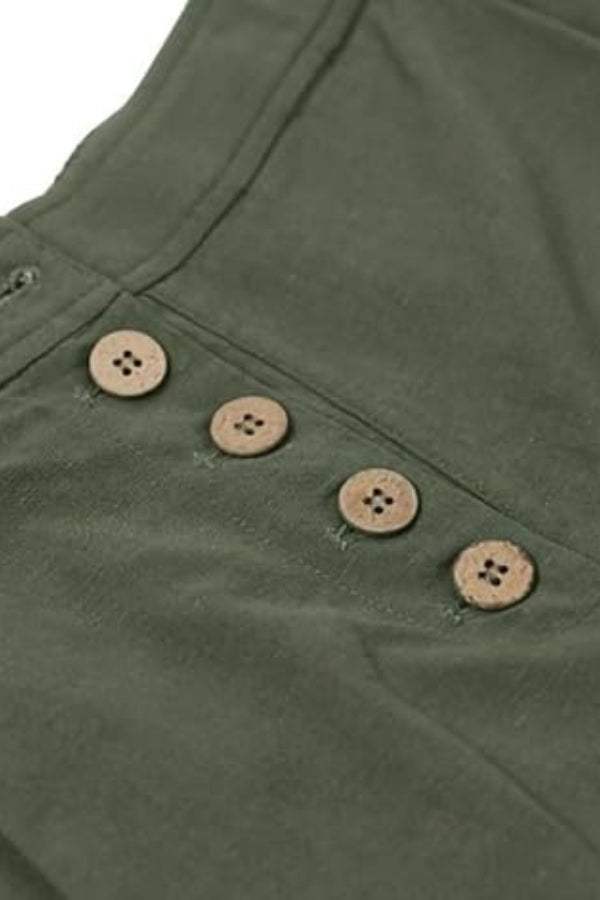 close-up of green button front high waist palazzo pants with four brown buttons