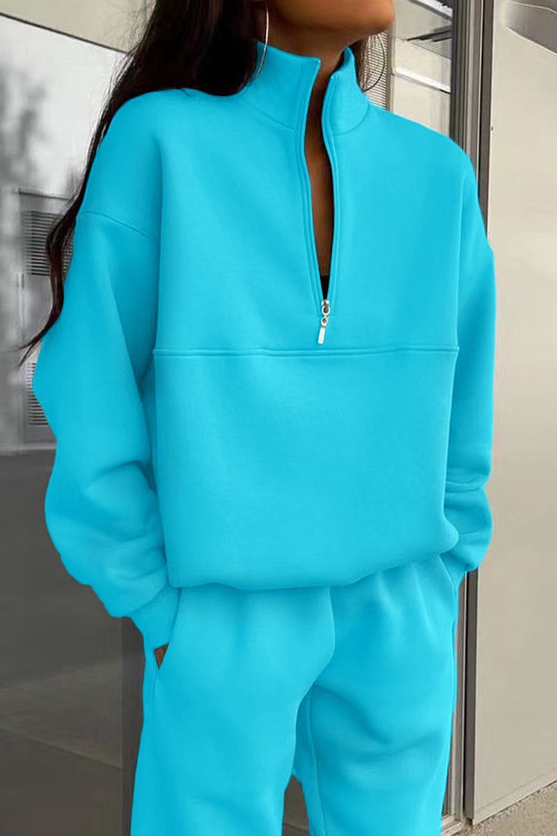 Women's cotton-blended two-piece tracksuit in bright blue with high collar and deep zipper, casual and comfortable athleisure wear.