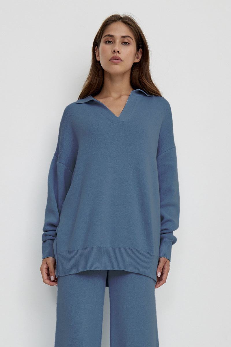 woman wearing blue plush and preppy camel two-piece set with polo collar and wide-leg pants