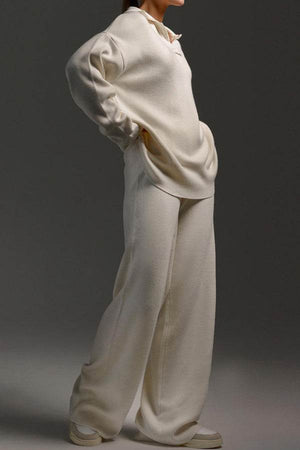 Plush and preppy camel two-piece set with polo collar pullover and wide-leg pants in soft, wrinkle-free fabric.