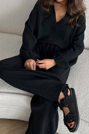 Black cotton collared two-piece set with bishop sleeves, loose fit, and V-neckline.