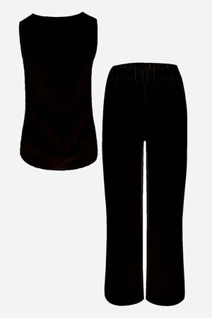 Black two-piece co-ord with sleeveless top and elastic waist trousers for apple-shaped body balancing