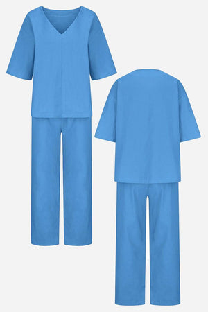Blue V-neck cotton two-piece trouser set with relaxed top and straight-leg pants, front and back views