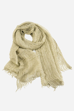 Lightweight beige linen scarf with frayed edges, breathable and versatile accessory from Christmas Collection