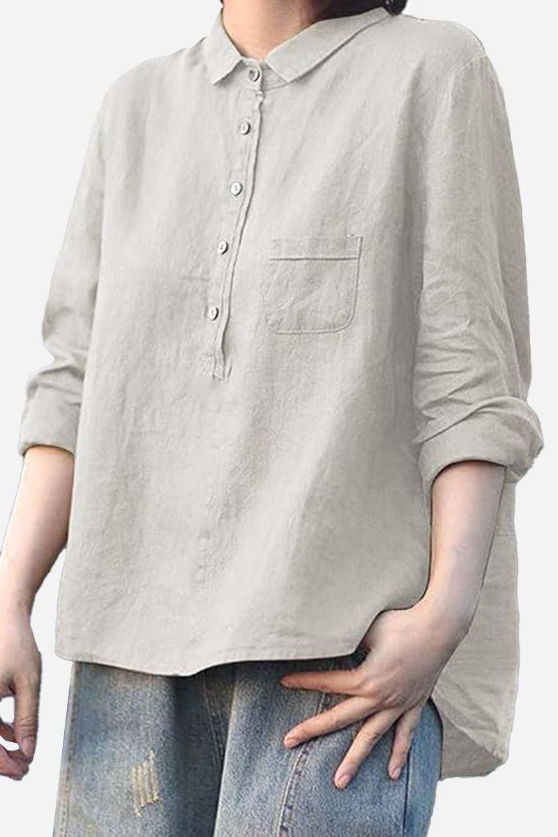 Vintage linen shirt in breathable cotton-linen blend with rolled sleeves and front pocket, styled casually with jeans.