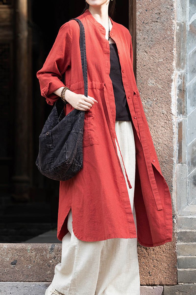 Oversized casual loose red ramie linen cardigan with open front worn over black top and white pants
