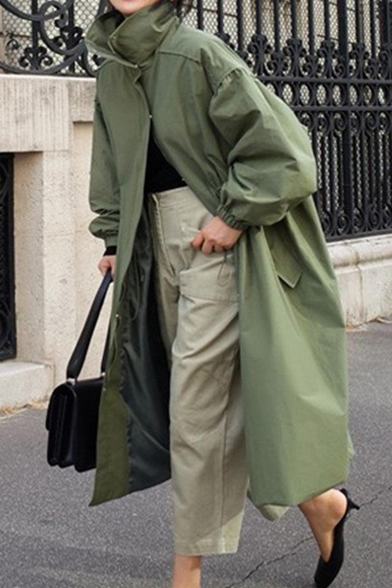 Oversized green cotton blend stain-resistant travel coat with button-front and lightweight design