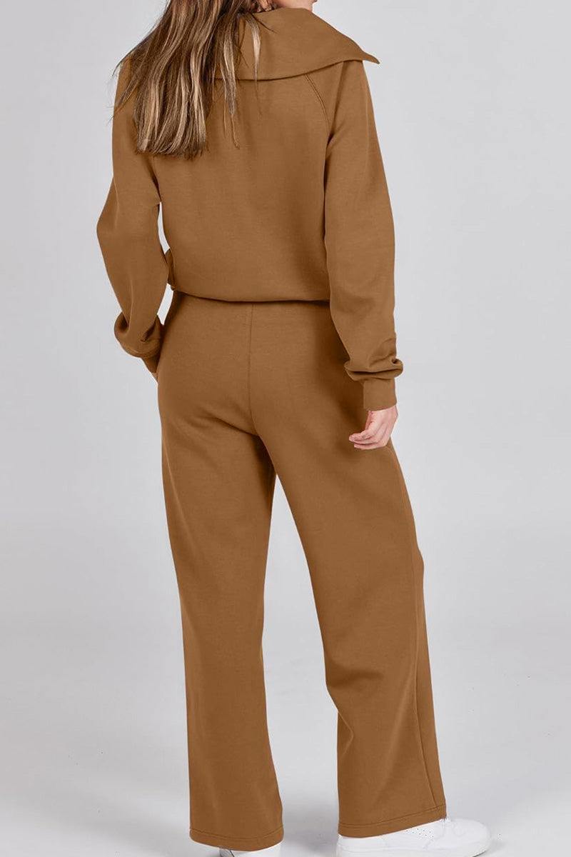 Back view of woman wearing brown Loungewear Buttersoft Tracksuit Set with oversized, cozy fit and wide-leg pants.