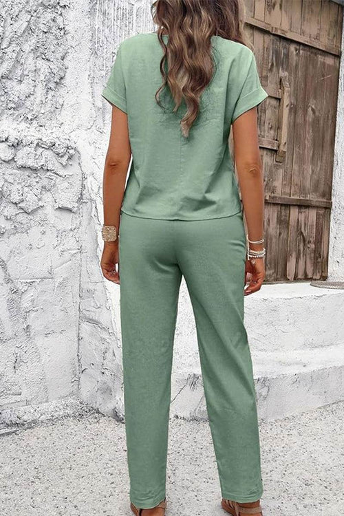 Woman wearing green 100% cotton Total Comfort Two-Piece Set standing outdoors back view
