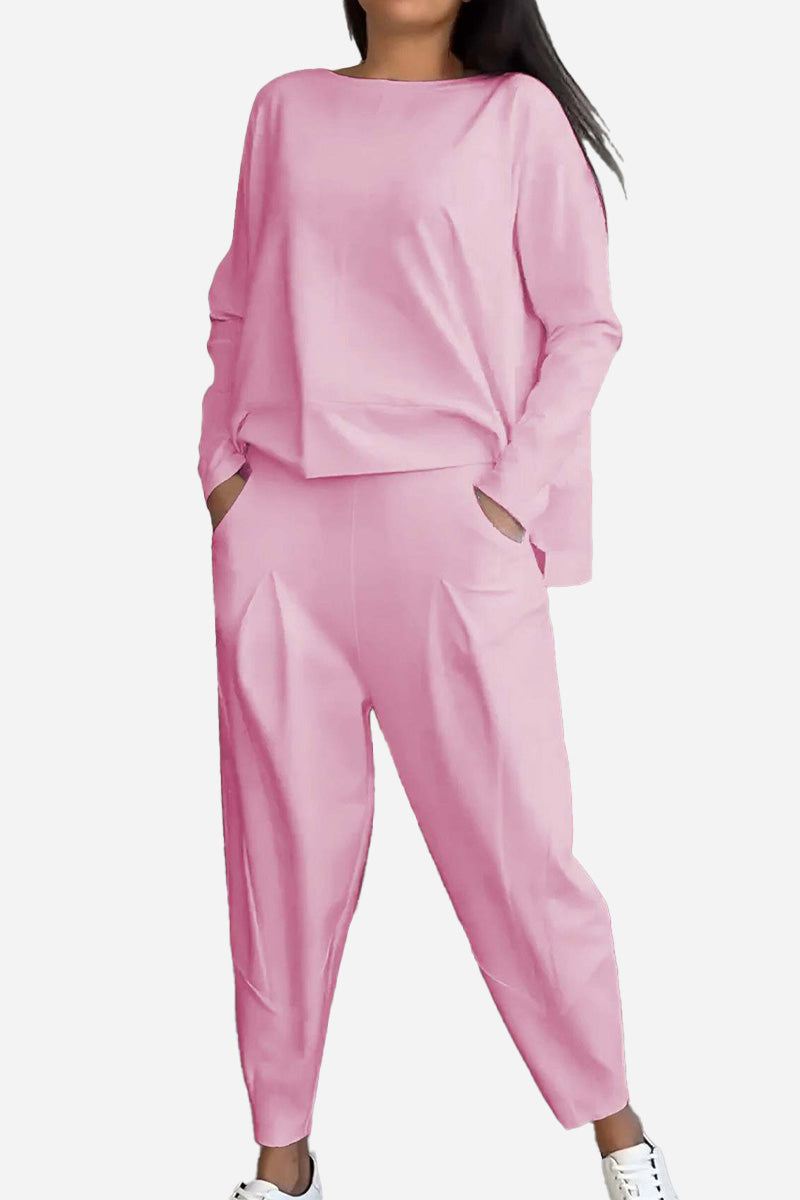 Woman wearing pink All-Day Comfort 2-Piece Outfit Set with long sleeves and tapered pants