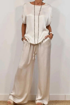 Silken Escape Satin Two-Piece Set with loose satin top and wide-leg pants in ivory cream