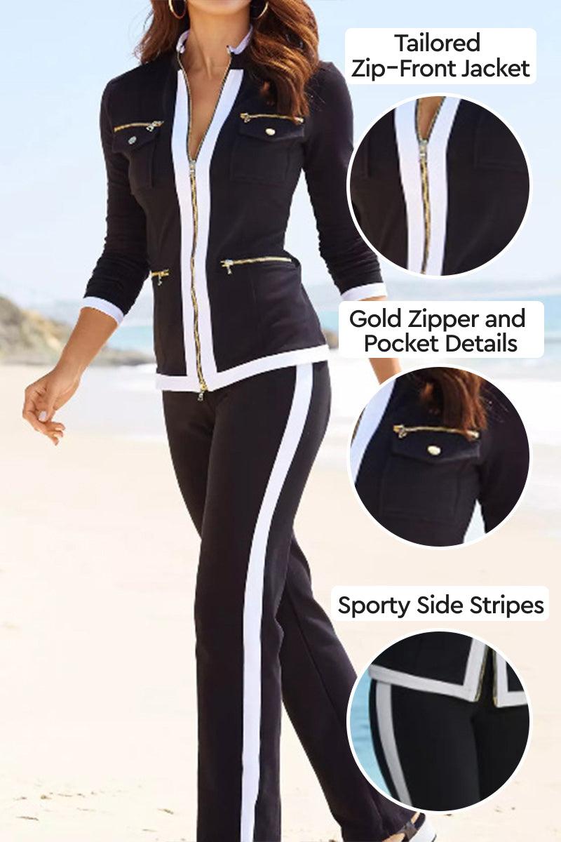 Black contrast zip two-piece with tailored zip-front jacket, gold zipper details, and sporty white side stripes.