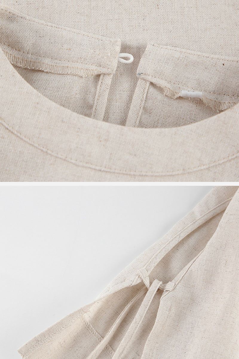 Close-up of breathable cotton-linen fabric texture and button loop detail on beige two-piece set