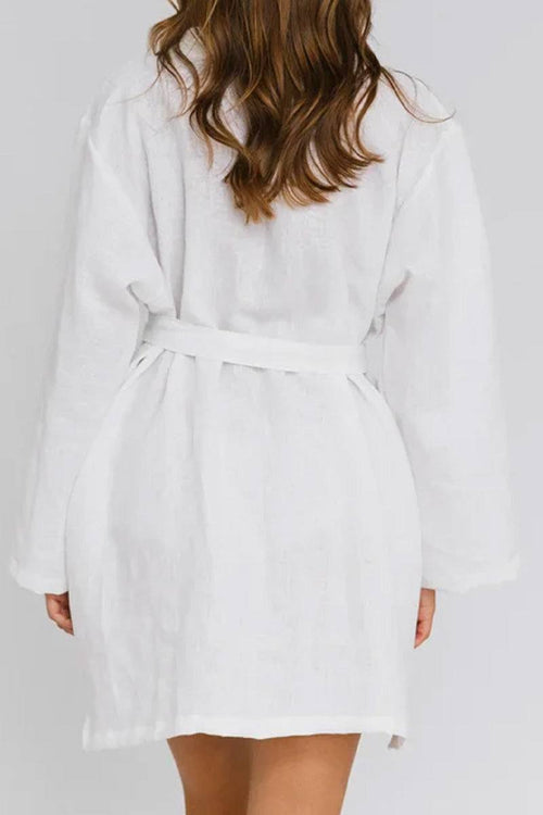 White cotton-linen blend luxury spa robe with belt, breathable and soft fabric, relaxed fit, ideal for comfort and elegance.