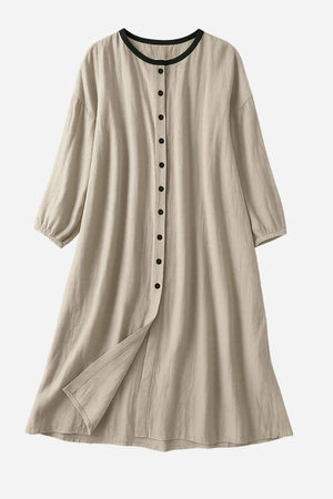 100% linen oversized button-down tunic dress in neutral beige with black contrast collar and buttons