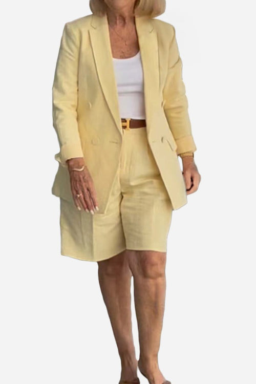 Stylish blazer and shorts two-piece set in light yellow, tailored blazer with matching shorts for women.