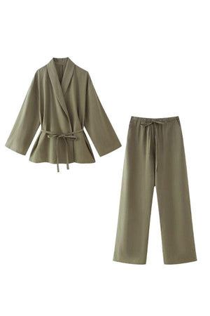 Olive green wide-leg pants and belted wrap top mix-match lounge-to-travel set for comfortable stylish wear