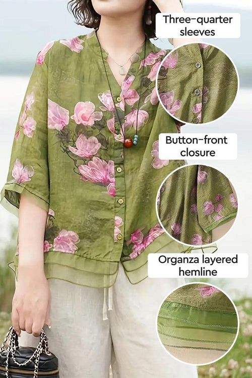 French boutique style organza floral print blouse with three-quarter sleeves and button-front closure