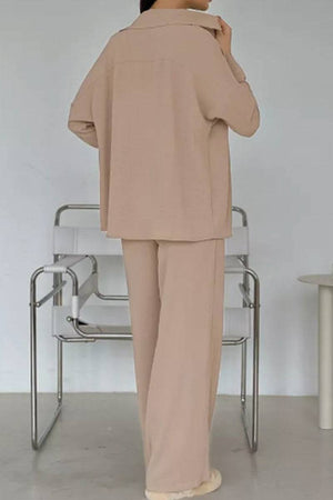 Beige relaxed fit wide-leg two-piece set with wrinkle-resistant fabric, ideal for travel and casual wear.