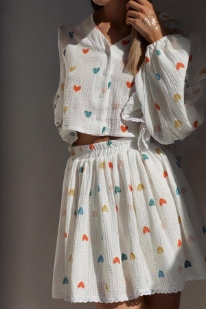 Sweet Countryside 100 Cotton ruffled two-piece set with colorful heart prints, breathable cotton fabric, and relaxed fit.