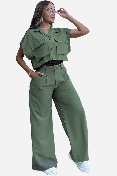 Woman wearing green two-piece big pocket cargo set with cropped top and wide-leg pants