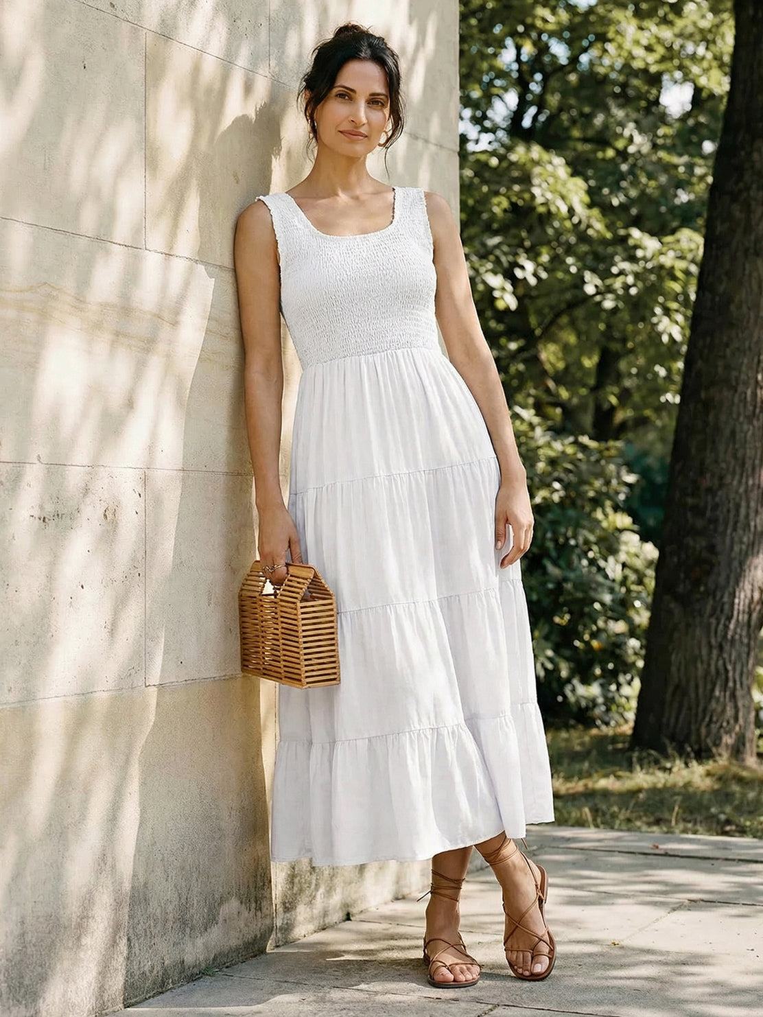 Smocked sleeveless maxi dress with tiered skirt and scoop neckline