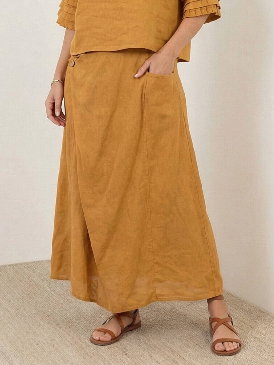 Two-piece 100% cotton wrap skirt and hip-length top set with crinkle texture and elastic waistband