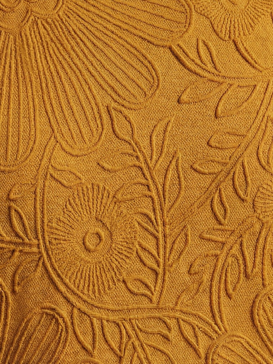 Floral jacquard pleated top with flutter sleeves and 3D floral texture