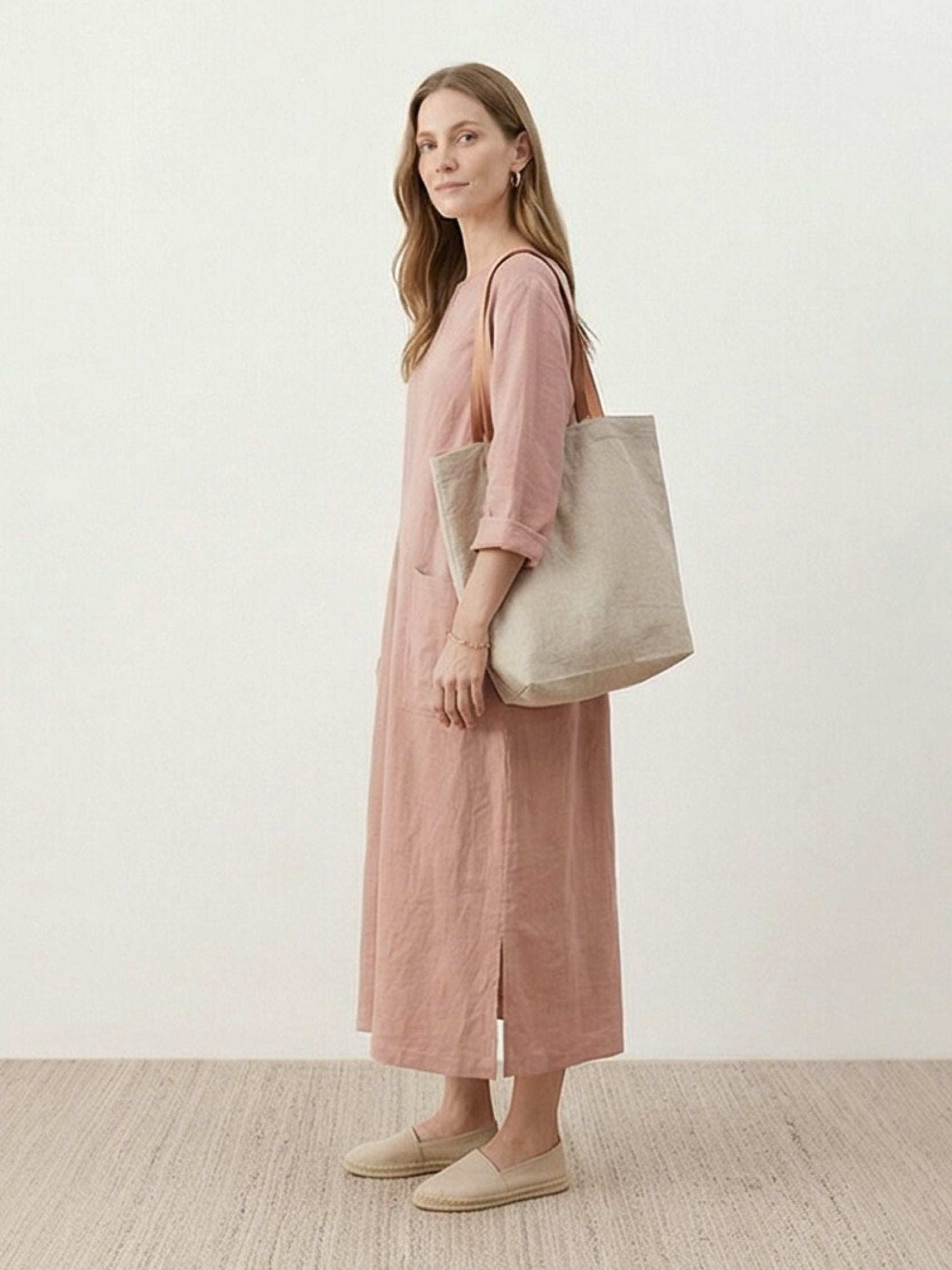 White 100% linen A-line maxi dress with 3/4 sleeves and large hip pockets