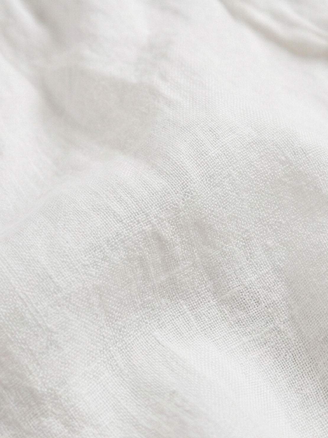 100% linen harem balloon pants with elastic drawstring waistband and side pockets in natural crinkle texture