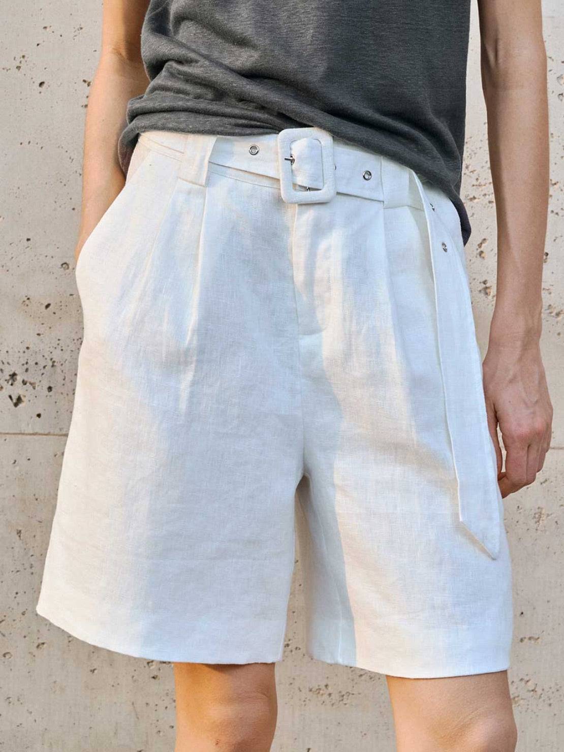 White 100% linen belted shorts with high-rise waist and wide-leg fit