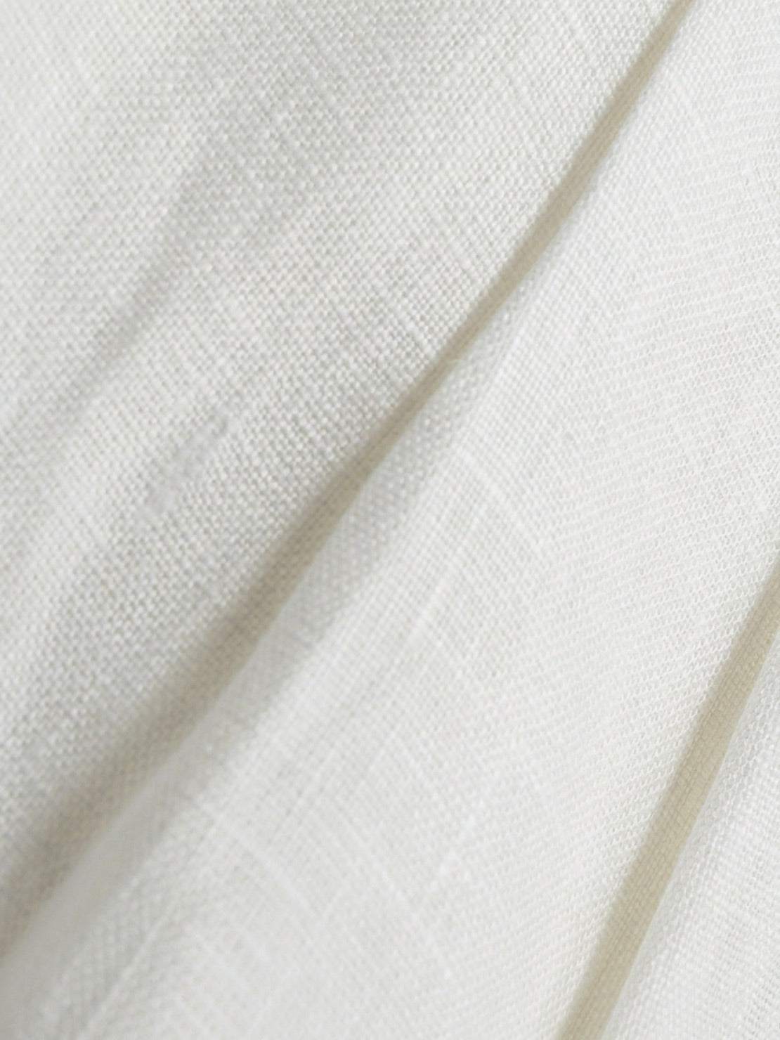 white 100% linen belted shorts with high-rise waist and relaxed wide-leg fit