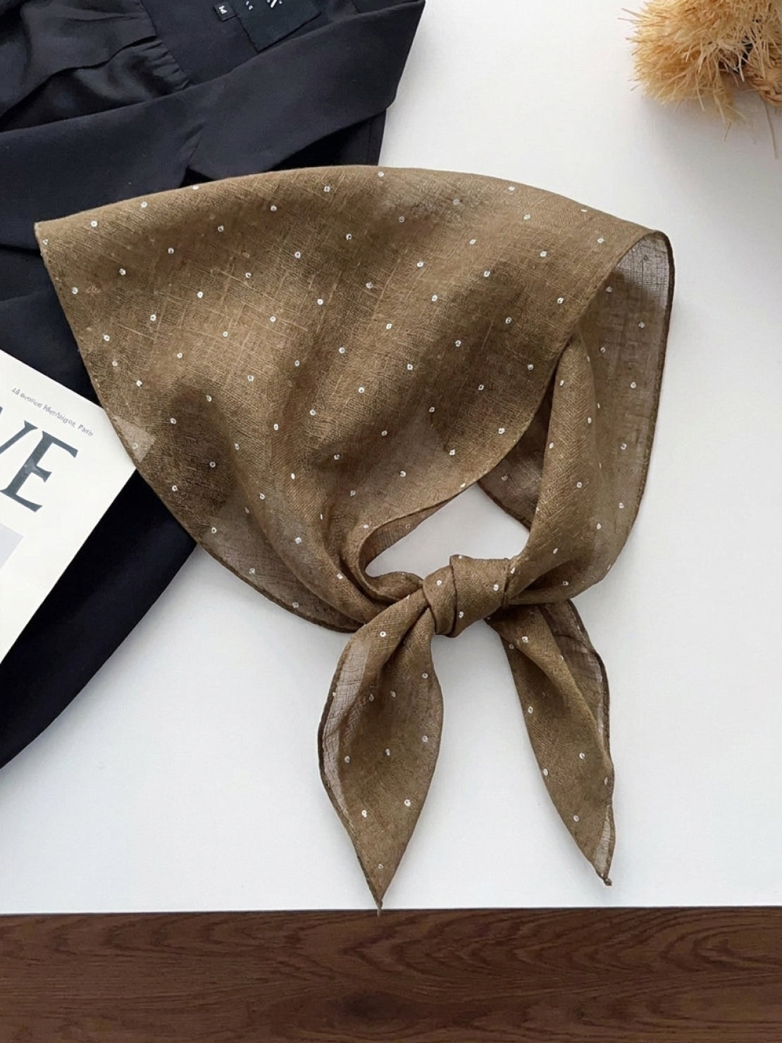 Lightweight 100% linen neck scarf with timeless checkered pattern and natural rolled edges