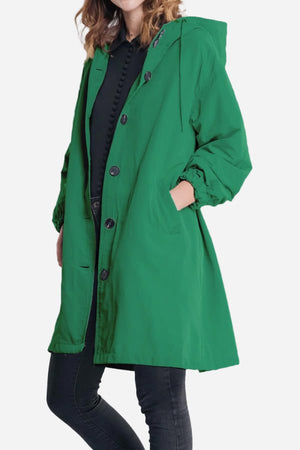 Green water resistant oversized hooded windbreaker rain jacket for women
