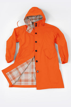 Orange water-resistant oversized windbreaker with hood and plaid lining.