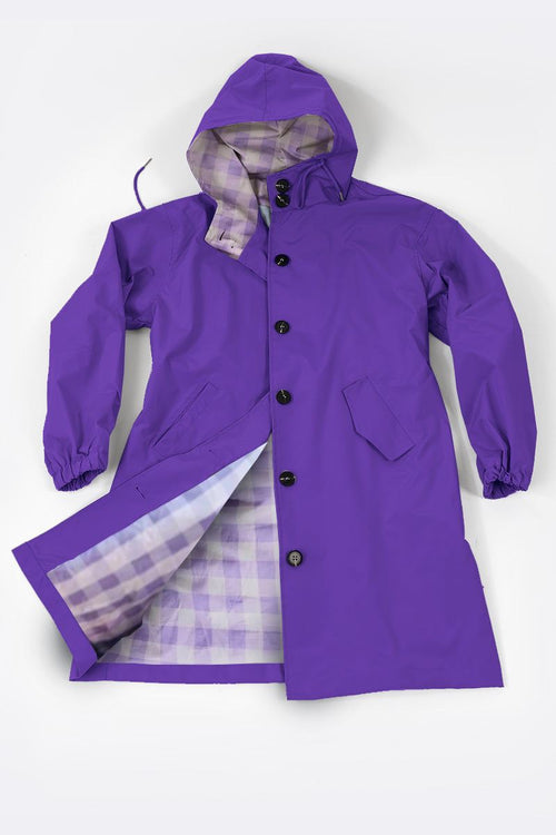 Purple water resistant oversized windbreaker with hood and plaid lining, button closure, and front pockets.