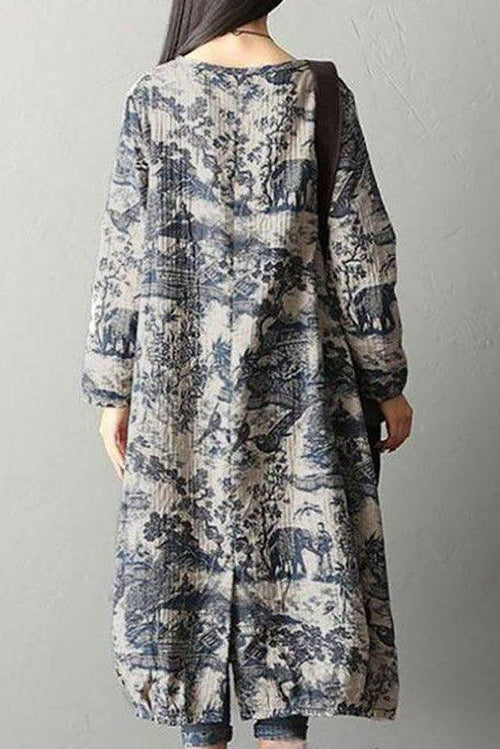 Back view of loose fit Japanese porcelain print midi dress with long sleeves and blue pattern on light beige background
