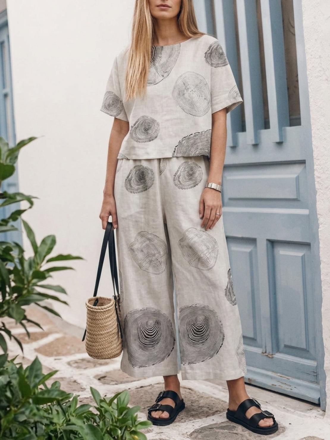 Woman wearing a soft cotton loose fit co-ord set with relaxed top and wide-leg bottoms