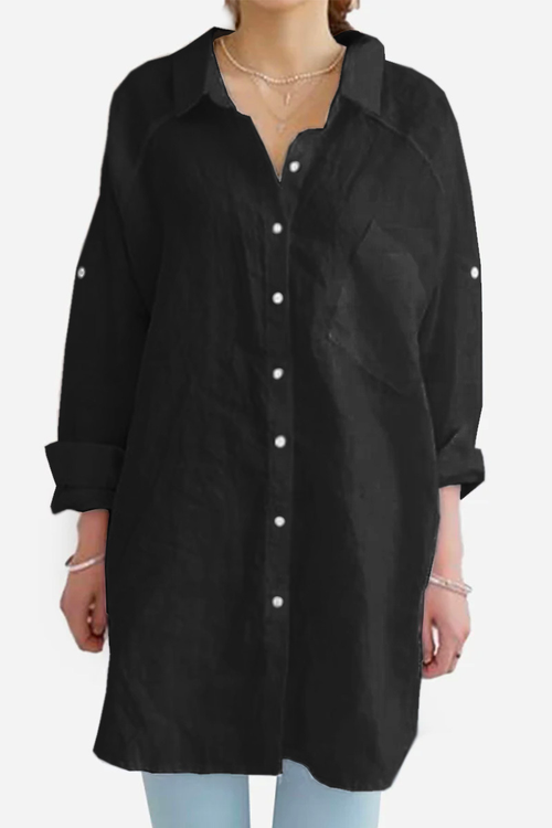 Black oversized linen shirt with rolled-up sleeves and buttons, styled casually on a model.