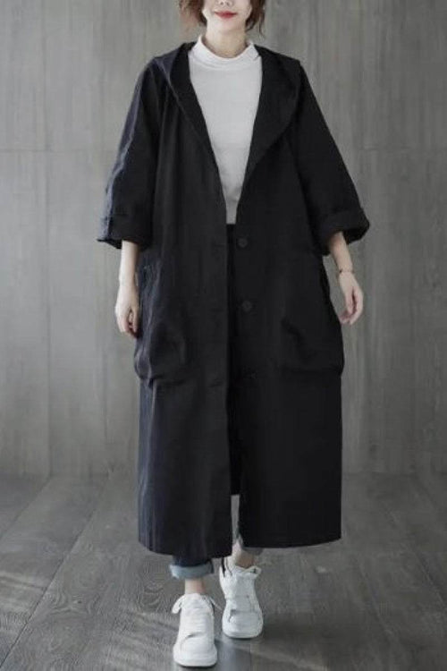 One size fits all oversized waterproof black windbreaker jacket with longline body and snap-button closure